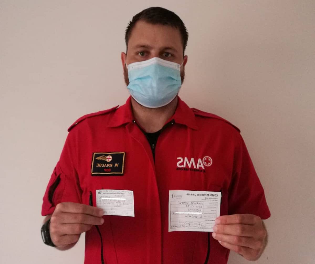 AMS employee gets booster shot